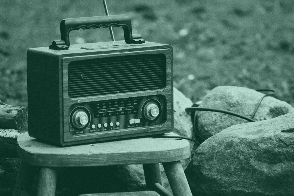 An image of a vintage radio outdoors.